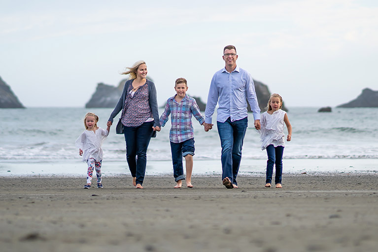 The Johnson family on a beach